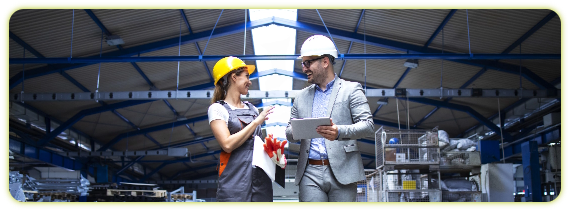 manager-supervisor-industrial-worker-uniform-walking-large-metal-factory-hall-talking-about-increasing-production (1).png